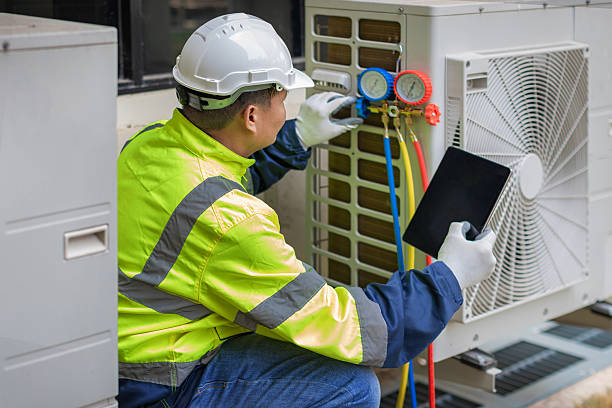 Professional Hvac technician working in Chisholm, ME